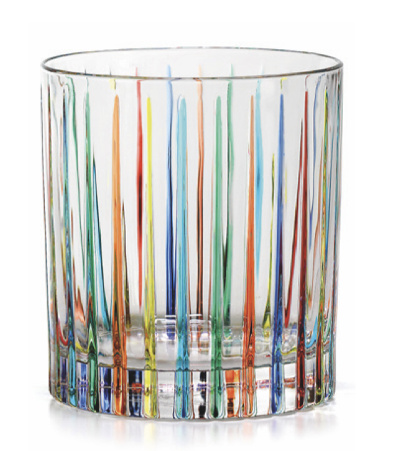 Clear glass tumbler with a heavy base, decorated with thin vertical stripes in red, orange, yellow, green, turquoise and blue rising from the bottom toward the rim.