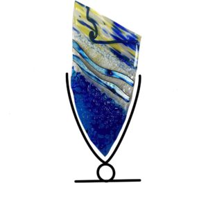 Elegant blue and yellow glass vase on black stand, adorned with Blue Sparkle details