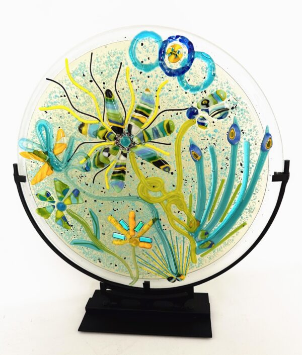 A colorful design featuring Petal Power displayed on a glass plate