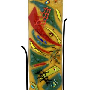 A vibrant glass sculpture featuring a bird perched on top, beautifully blending yellow and red hues